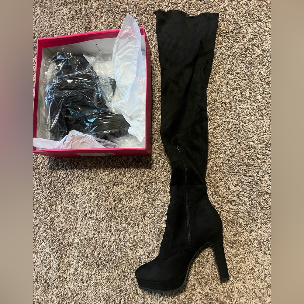 Black thigh high 3 1/2 inch heeled boot